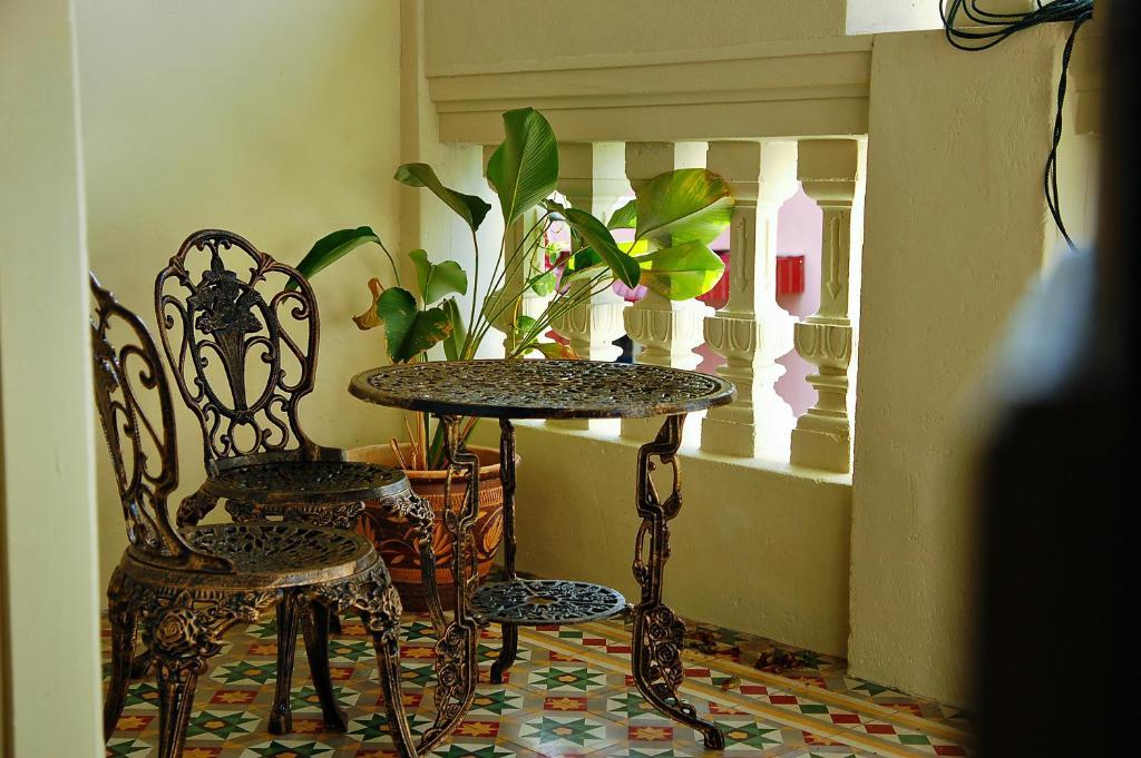 Palanquinn Heritage Suites Джордж Таун Стая снимка
